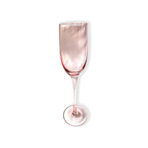 Pink tinted drinking glass with vintage design.