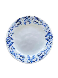 Ocean-inspired ceramic plate with deep blue tone.